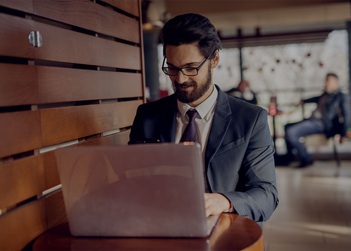 Man typing on laptop